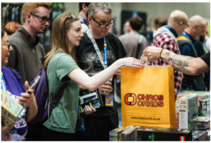 Serving a customer at UK Games Expo